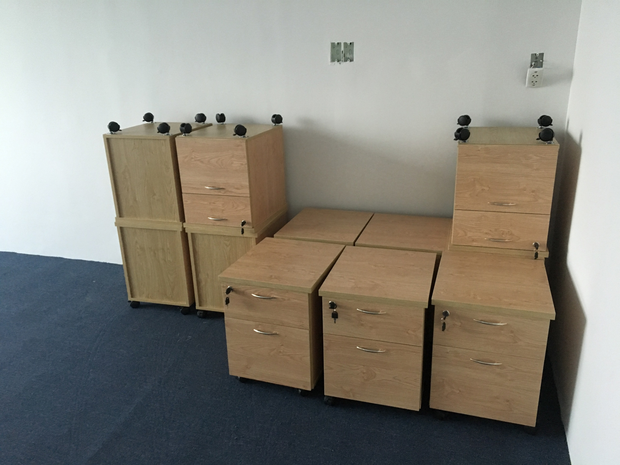 Sản xuất và lắp đặt hộc gỗ di động cho văn phòng công ty NL